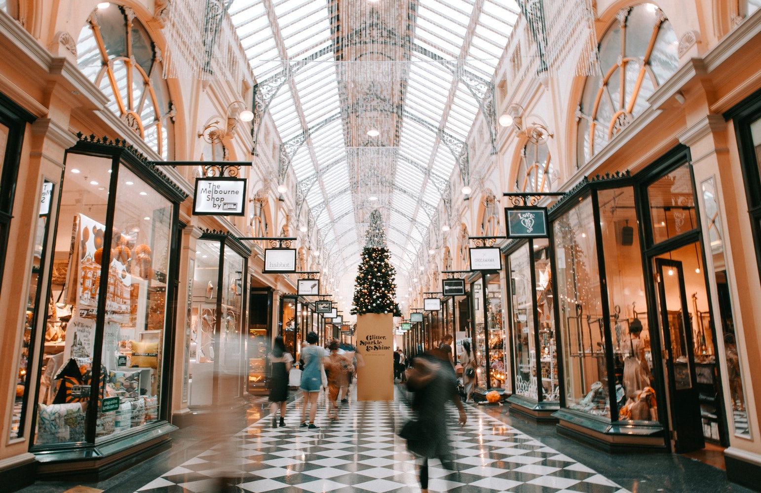 a shopping mall where people are walking