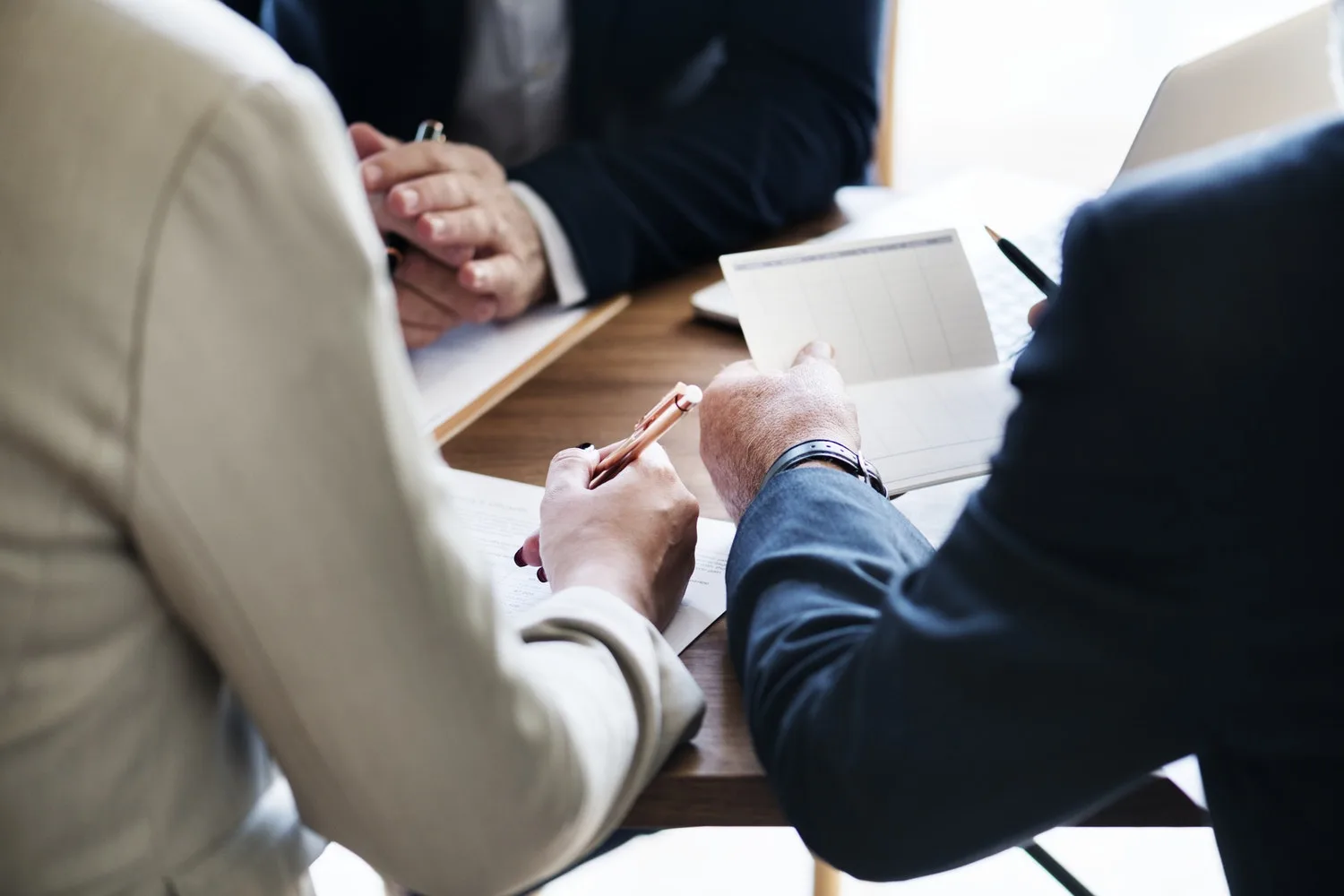 three businessman having a meeting